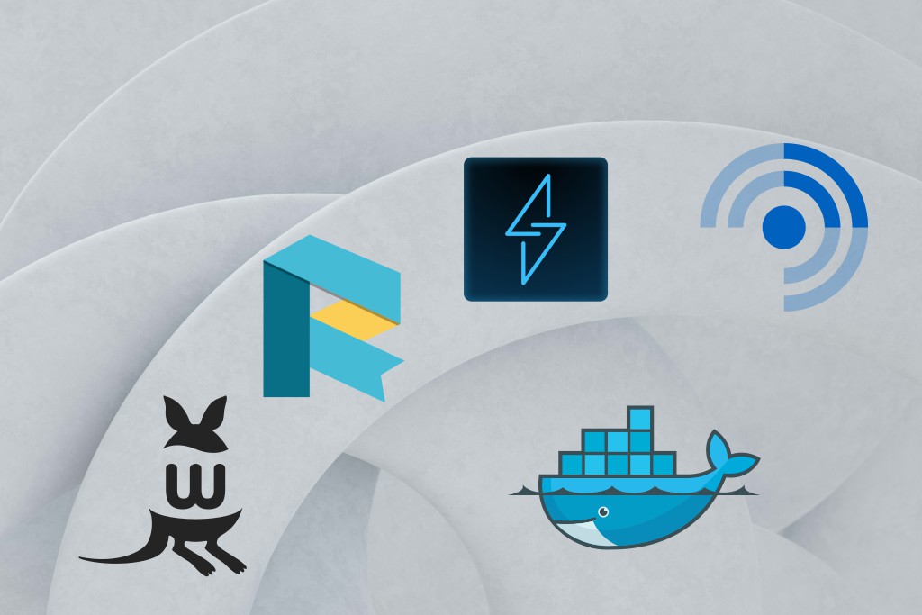 A light gray abstract background with soft curved shapes features five tech logos arranged across the image. At the top center is the Wallabaga logo, a dark square with a stylized lightning-like symbol. To the right is the Linkwarden logo, composed of blue concentric arcs forming a circular signal pattern. On the left is the Readeck logo, a geometric ribbon-like “R” in teal and yellow. At the bottom left is the FreshRSS logo, a minimalist black bird icon. At the bottom right is the Docker Swarm logo, a blue whale carrying stacked container blocks on its back.